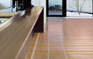 Warm floor under the laminate on a wooden floor: types and features