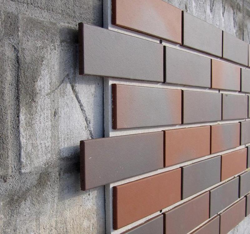 Decorative cladding panel imitating brickwork