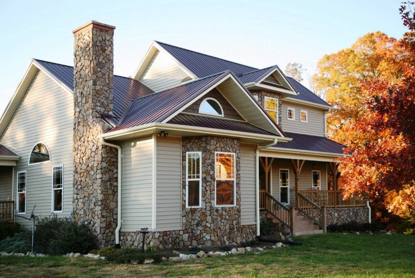 Combination of artificial stone and siding