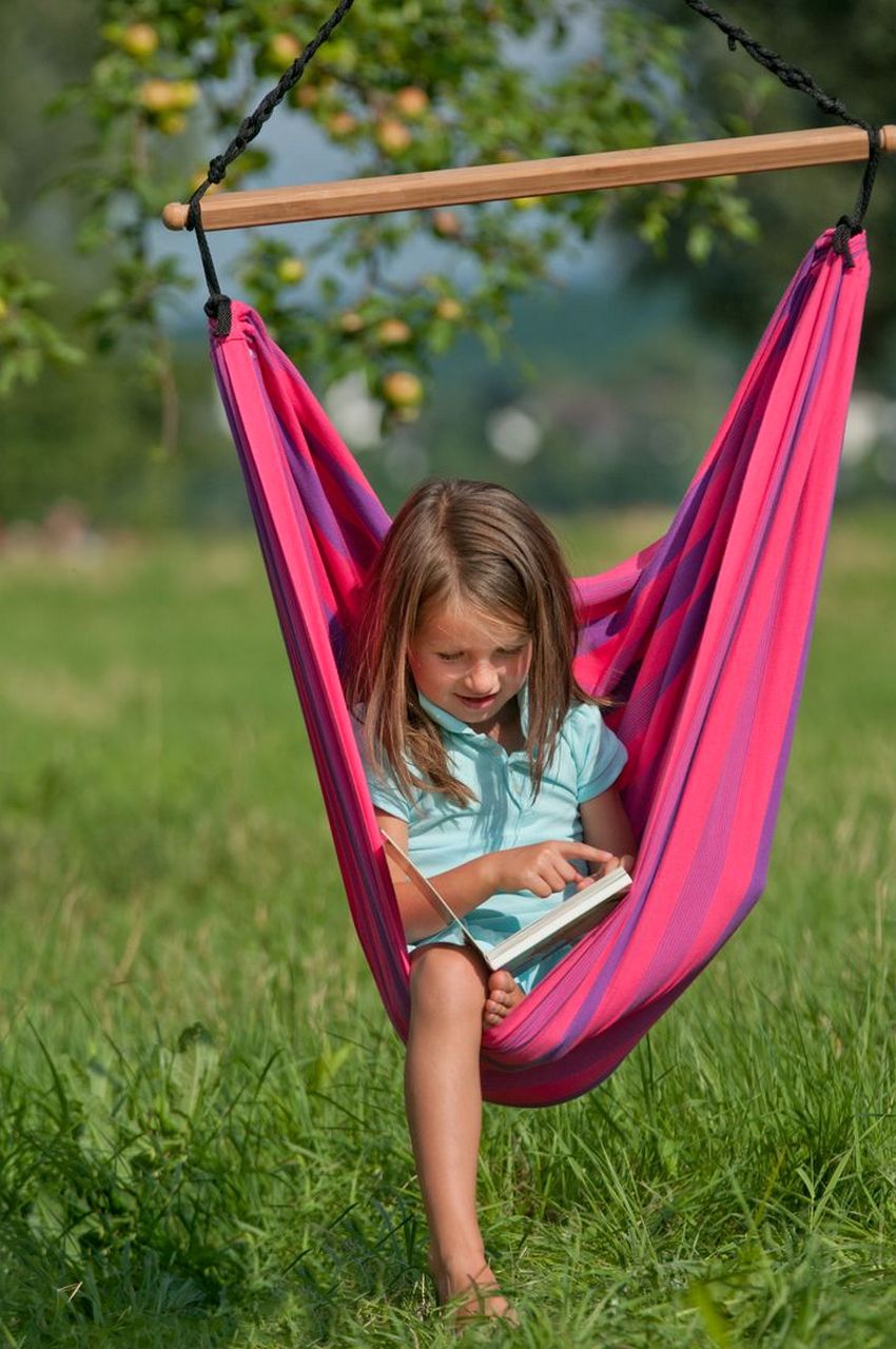 Comfortable hammock-type swing for children made of thick colored fabric