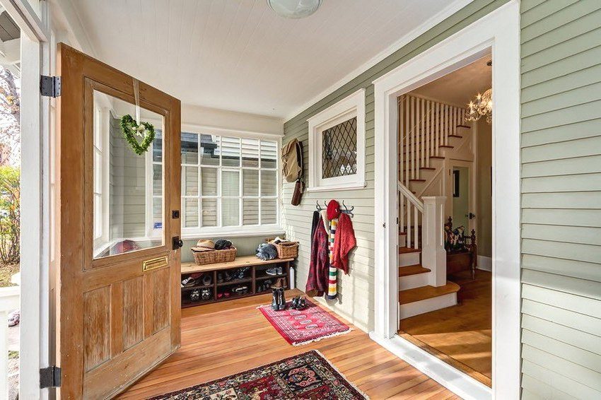A closed veranda in the warm season can become a full-fledged hallway
