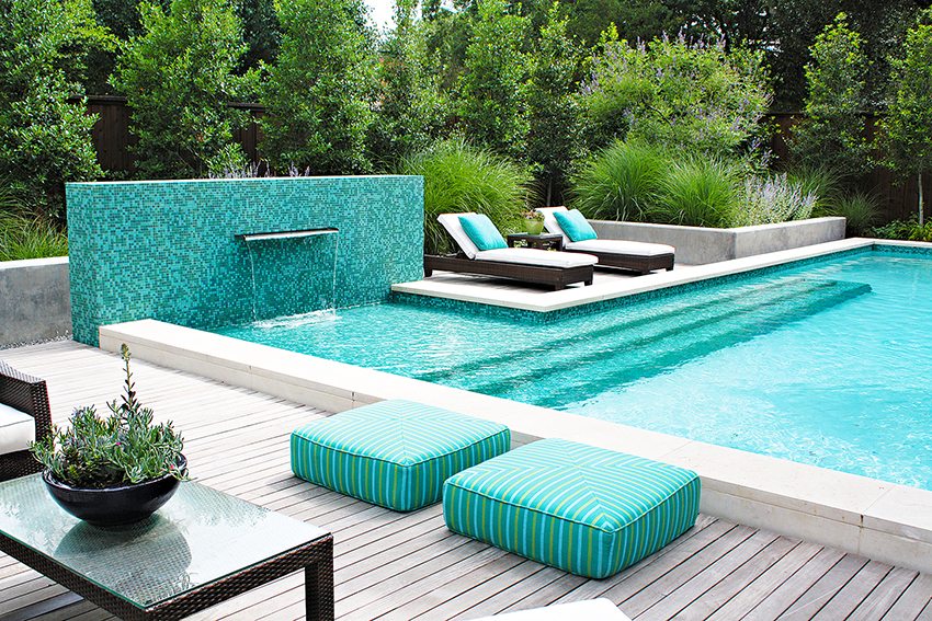 A concrete pool can be decorated with a beautiful waterfall
