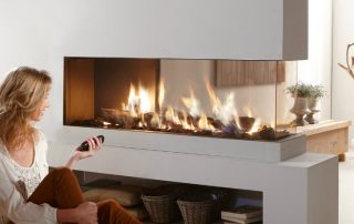 Șeminee electrice cu efect de foc viu: un decor interior elegant