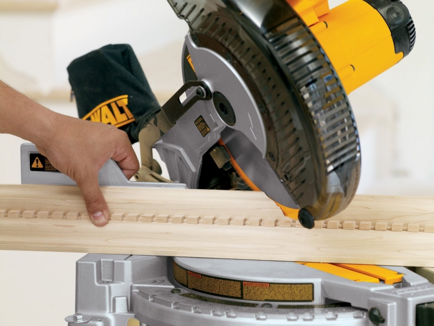 The wood miter saw is used to cut material at a specific angle