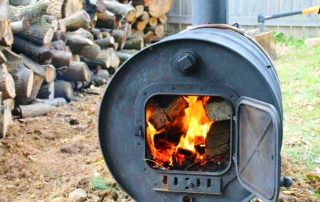 Bếp từ thùng: một lựa chọn đơn giản để tổ chức sưởi ấm trong các phòng tiện ích