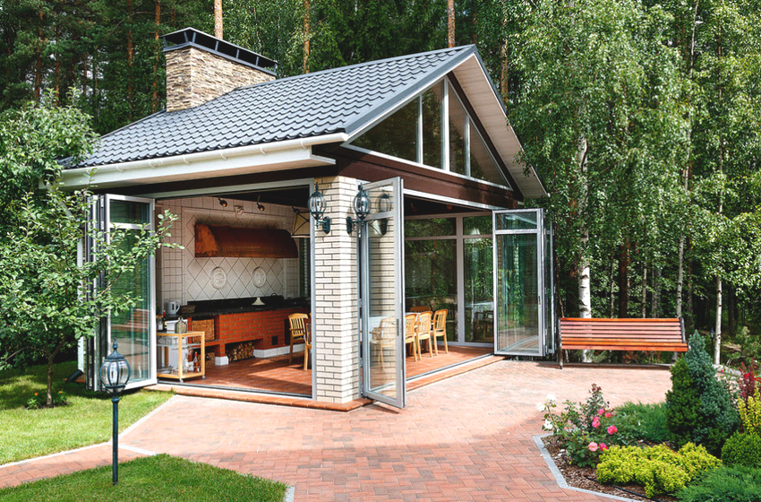 If the gazebo is not equipped with a kitchen, then it is advisable to install it closer to the house.