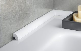 Obrubník v koupelně: estetický a atraktivní způsob, jak eliminovat zbytečné mezery