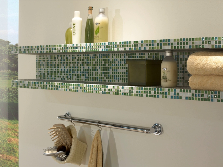 Bathroom shelf tiled with mosaics